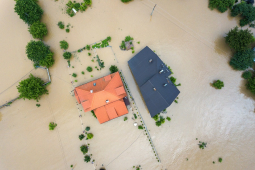 Birds eye view flooded homes STOCK