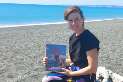 Rachel Haydon with beach book